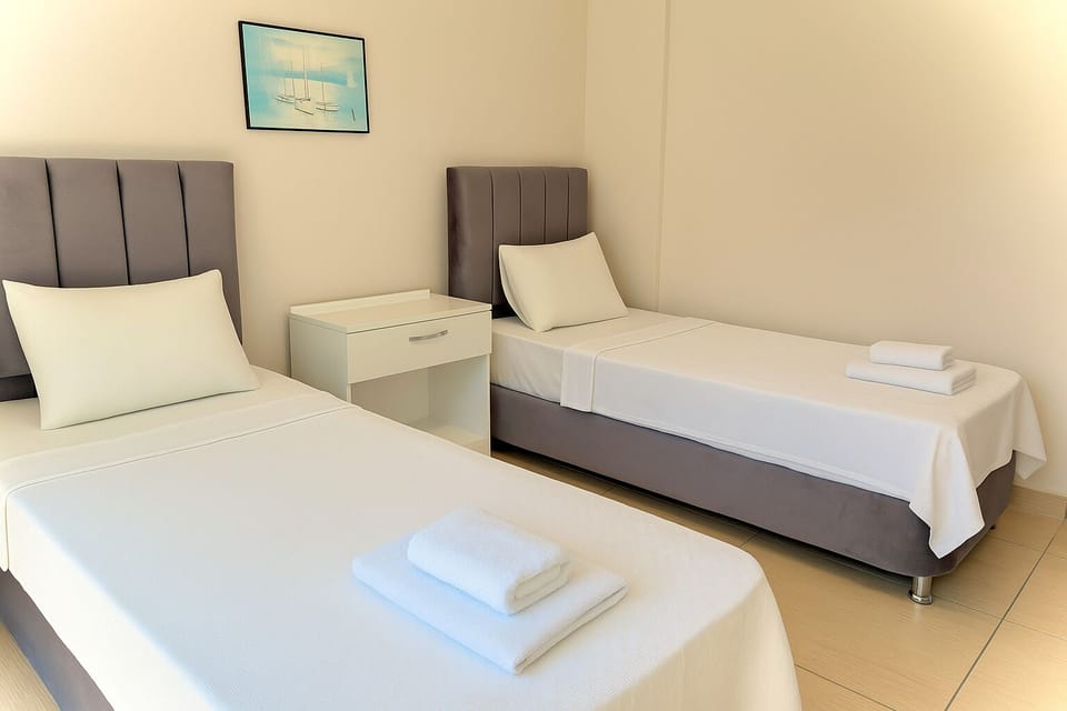 Deluxe Room, 3 Bedrooms | Minibar, in-room safe, desk