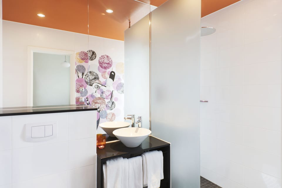 In-room safe, desk, blackout drapes, free cribs/infant beds