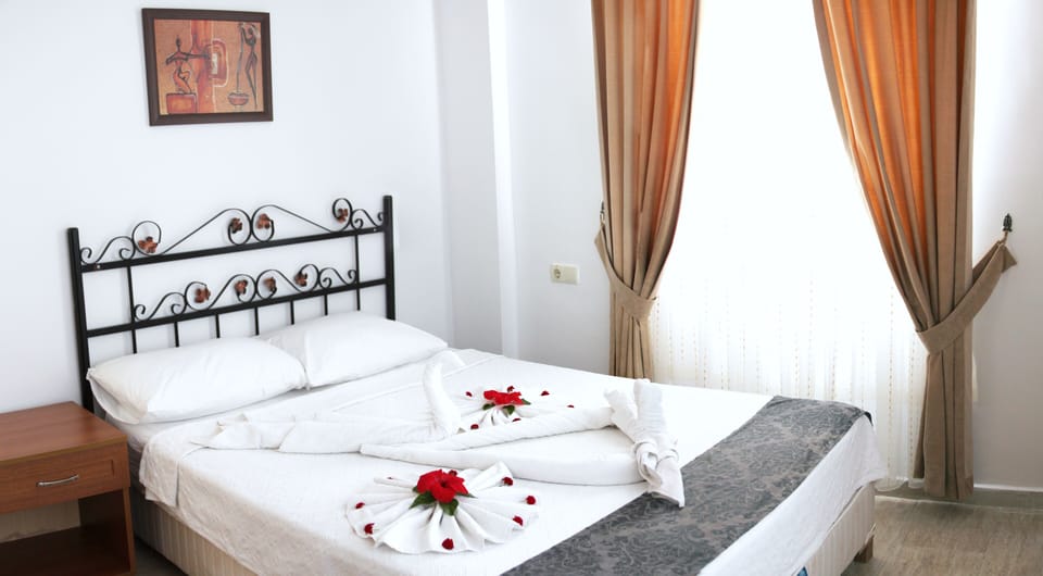 Apartment, 2 Bedrooms | In-room safe, iron/ironing board, free cribs/infant beds, bed sheets