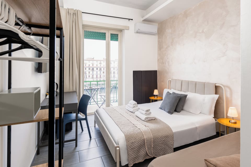 Triple Room, Multiple Beds, City View | In-room safe, desk, soundproofing, free WiFi
