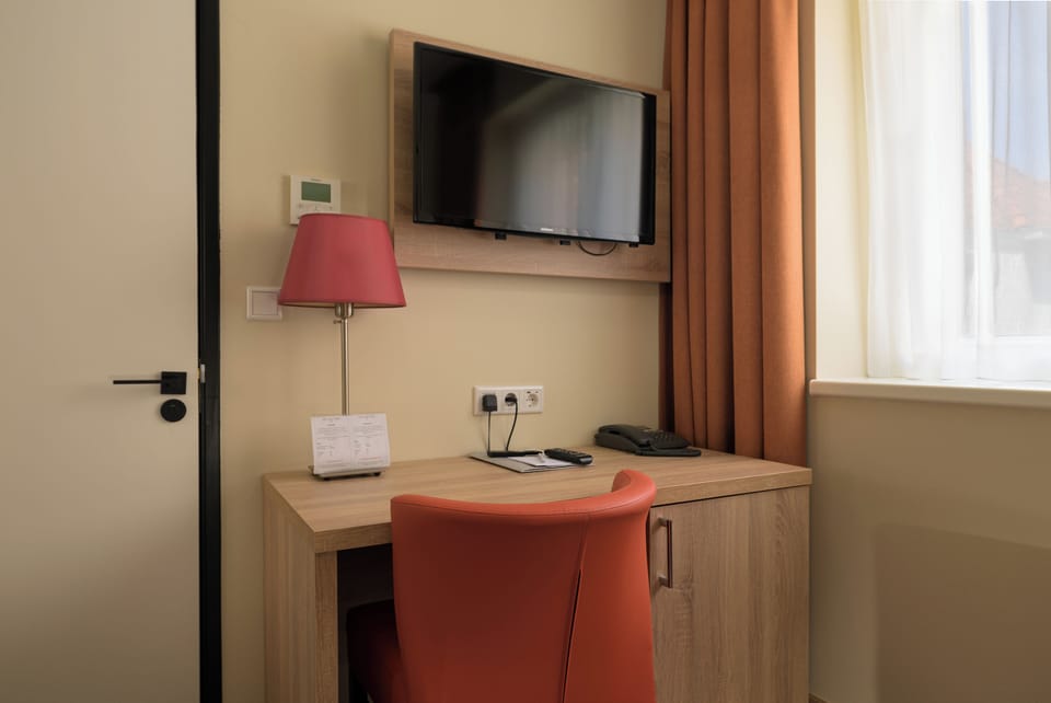 Desk, free WiFi, bed sheets