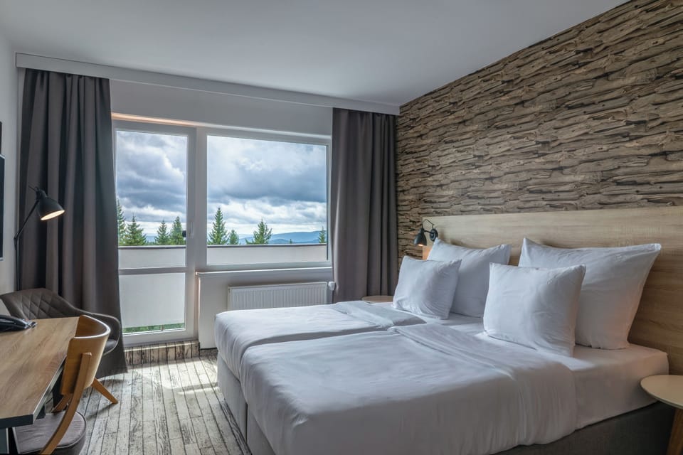 Executive Double Room, Balcony (PLUS) | Desk, blackout drapes, iron/ironing board, free WiFi