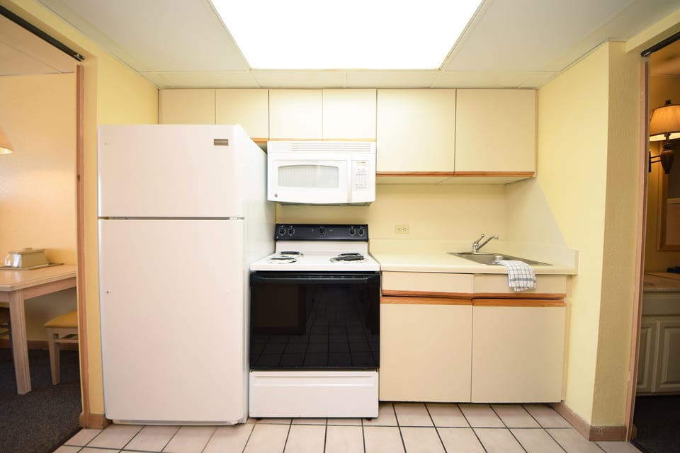 2 Bedroom Oceanfront Efficiency (Suite) with 3 Queen Beds - A2 | Private kitchenette | Full-size fridge, microwave, coffee/tea maker