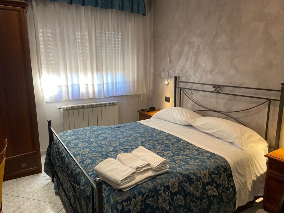 Double or Twin Room, 1 Double Bed | Down comforters, desk, blackout drapes, iron/ironing board (on request)