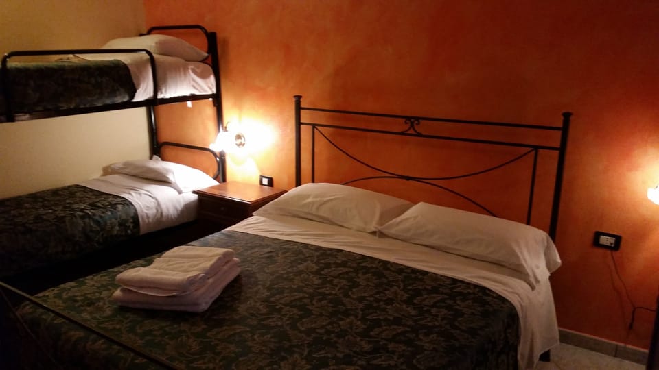 Down comforters, desk, blackout drapes, iron/ironing board (on request)