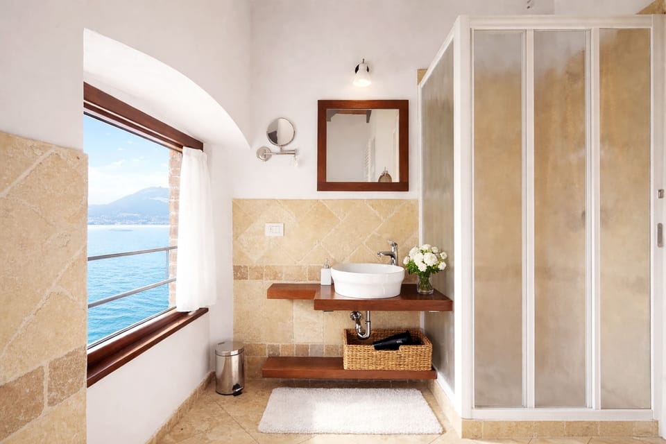 Superior Double or Twin Room (Varenna) | Bathroom | Shower, free toiletries, hair dryer, slippers