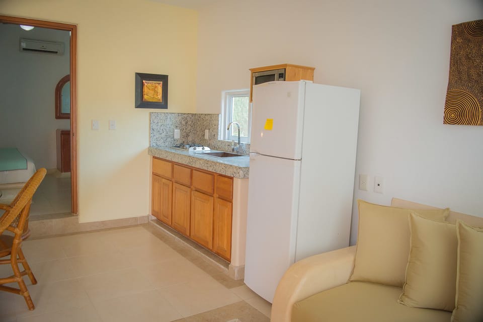 Superior Bungalow, Pool View | Private kitchenette | Full-size fridge, microwave, stovetop, coffee/tea maker