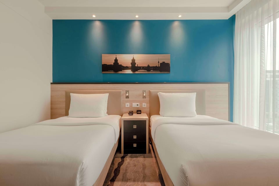 Hypo-allergenic bedding, in-room safe, desk, laptop workspace