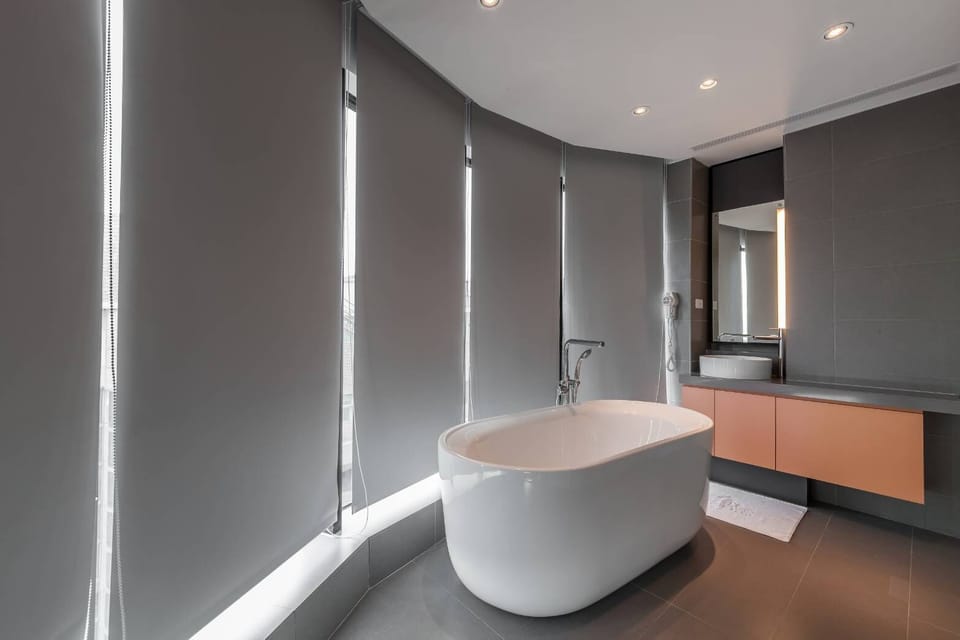 Superior Double Room, City View | Bathroom | Shower, hair dryer, slippers, towels