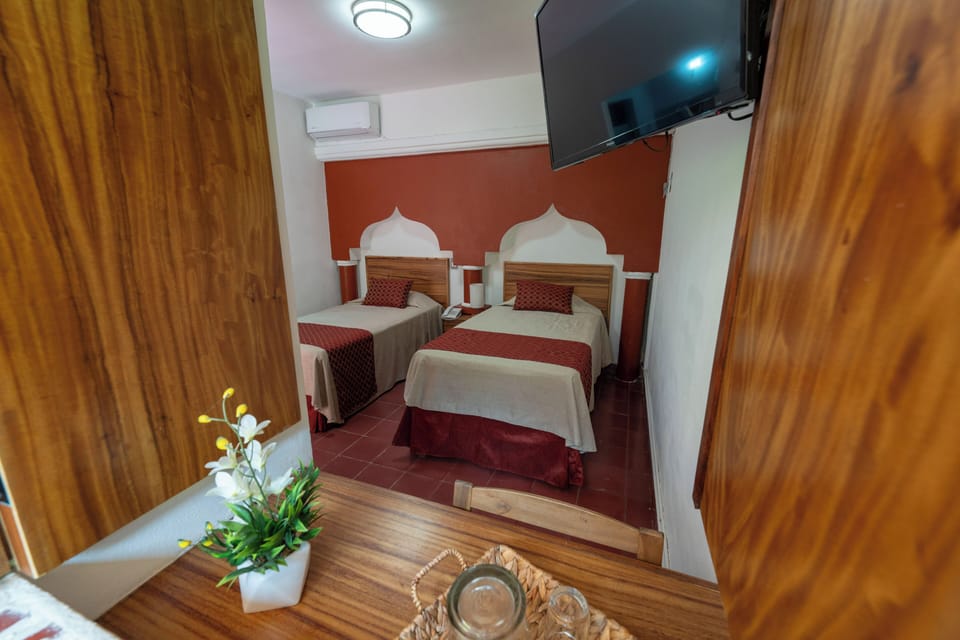 Basic 2 single beds no view  | Individually furnished, desk, free WiFi, bed sheets