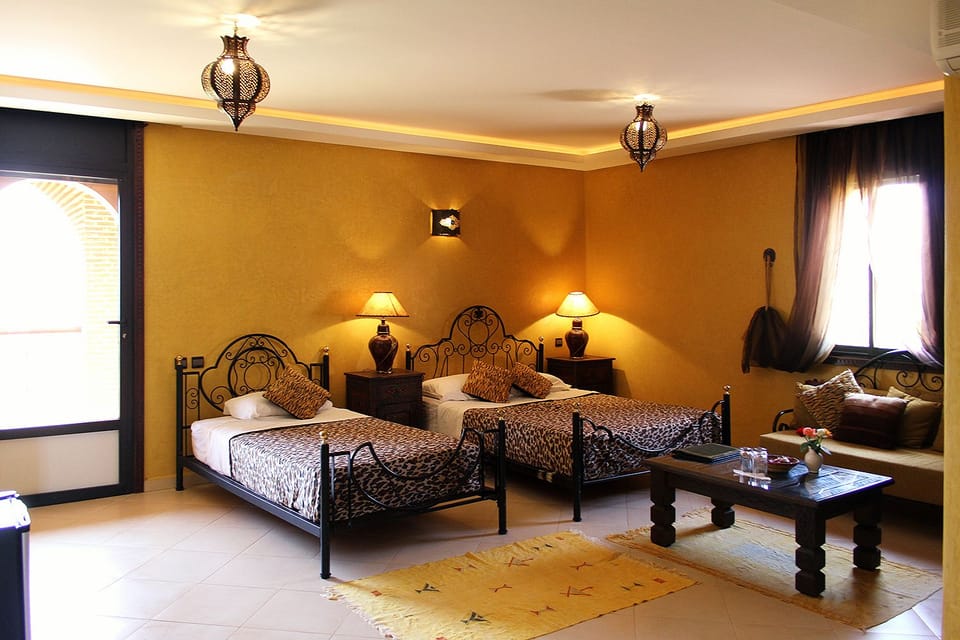 Family Triple Room, City View (Amine) | Minibar, in-room safe, iron/ironing board, free WiFi