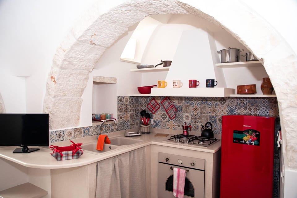 Classic Apartment, 1 King Bed with Sofa bed (Il ciliegio) | Private kitchen | Full-size fridge, stovetop, espresso maker, coffee/tea maker