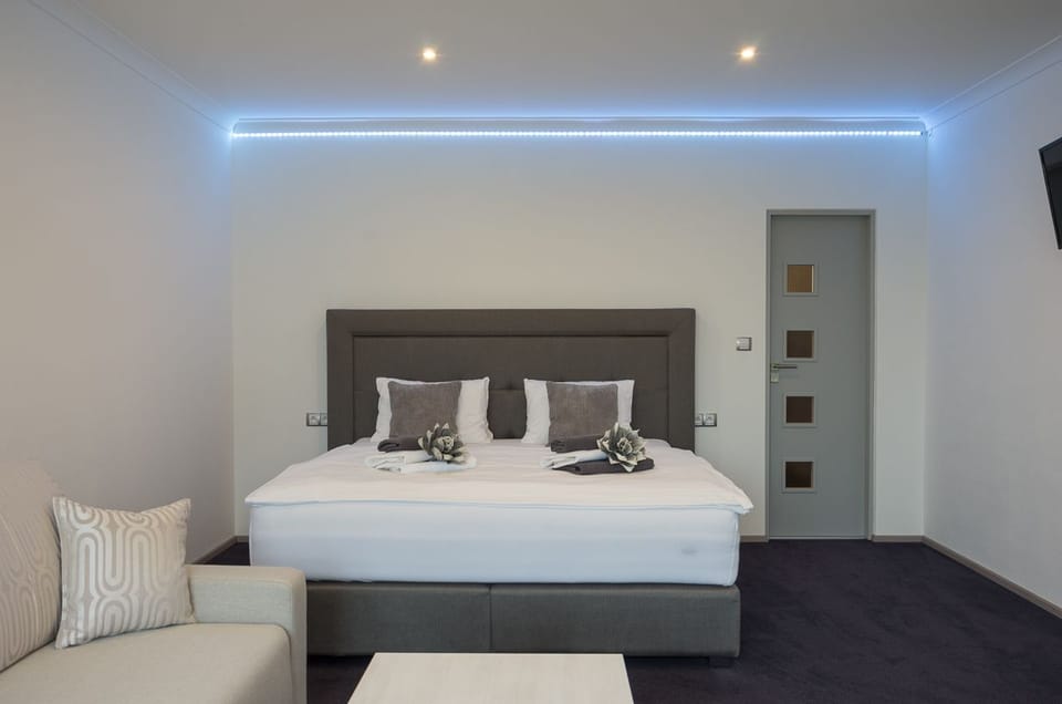 Deluxe Studio, Kitchenette (A - with Terrace) | Desk, soundproofing, iron/ironing board, free cribs/infant beds