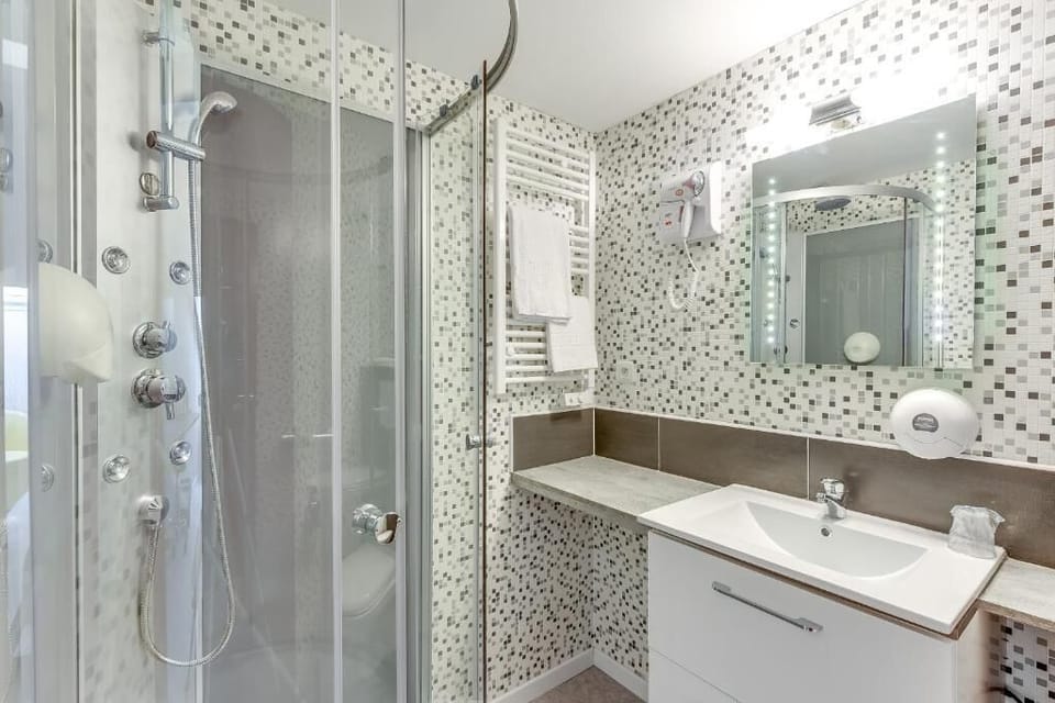 Deep soaking tub, rainfall showerhead, free toiletries, hair dryer