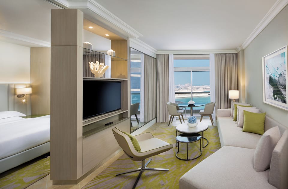 Apartment, 1 Bedroom, Balcony | In-room safe, desk, blackout drapes, iron/ironing board