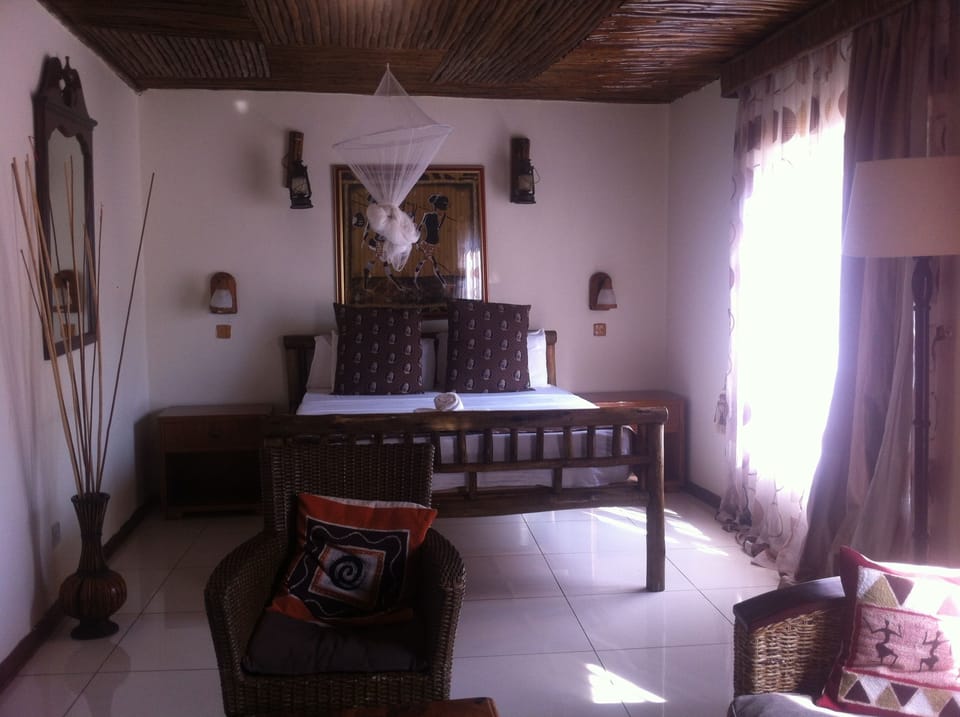 Executive Room, Garden View | Living area | TV