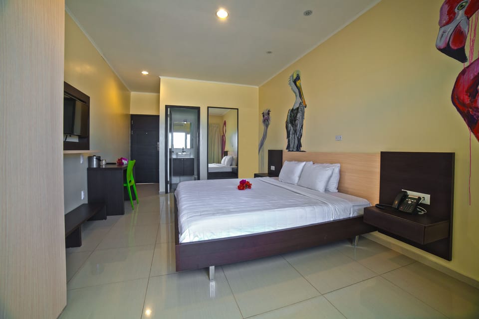 Deluxe Room, 1 King Bed, Balcony | Desk, laptop workspace, iron/ironing board, free WiFi