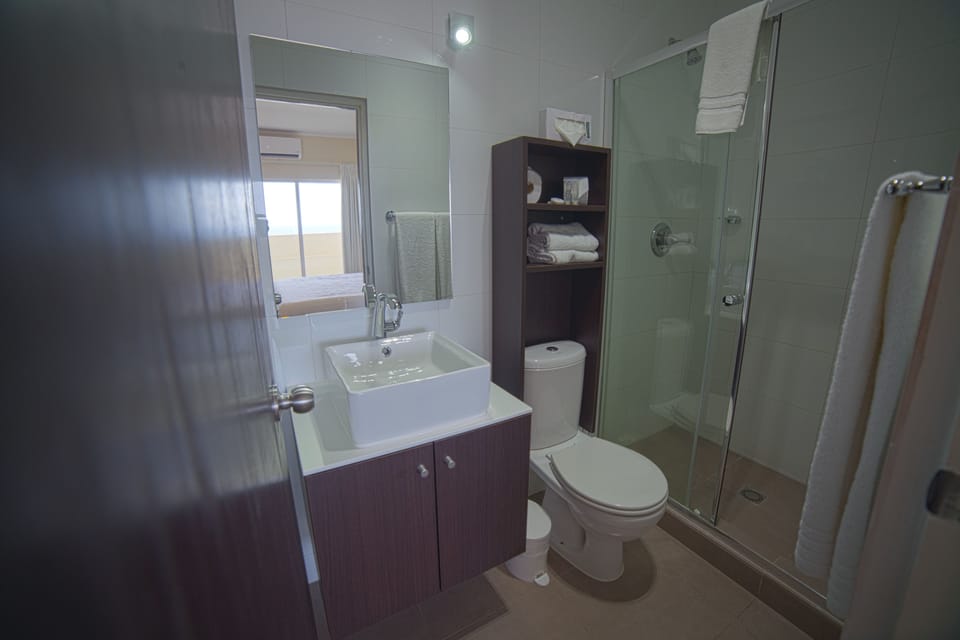 Shower, free toiletries, hair dryer, towels
