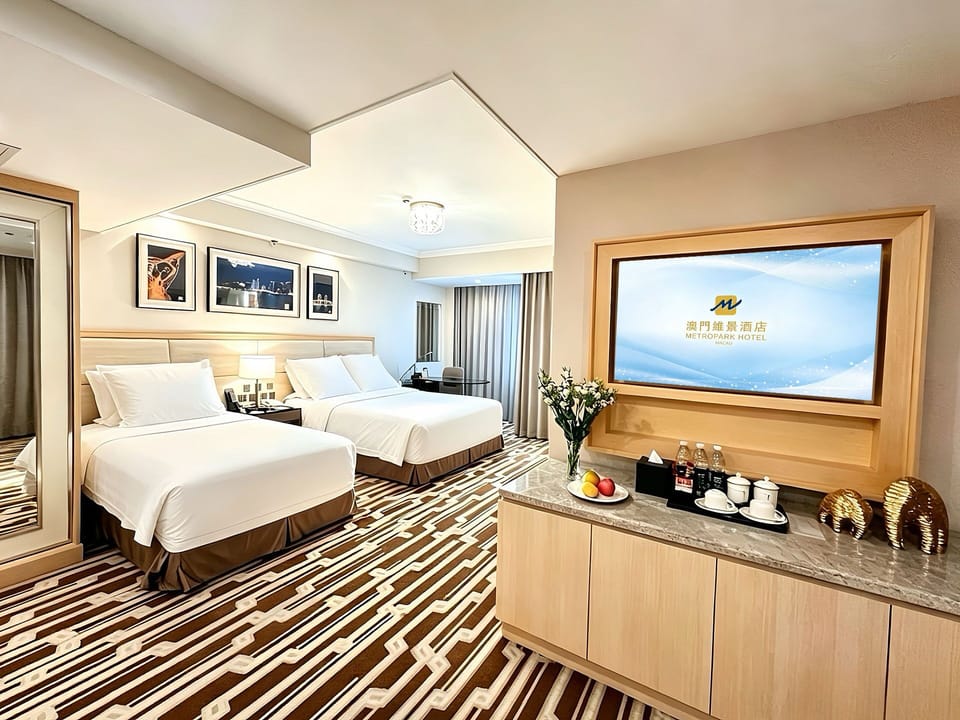 Family Deluxe Room | Down comforters, minibar, in-room safe, desk