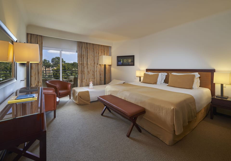 Family Room | Hypo-allergenic bedding, minibar, in-room safe, free WiFi