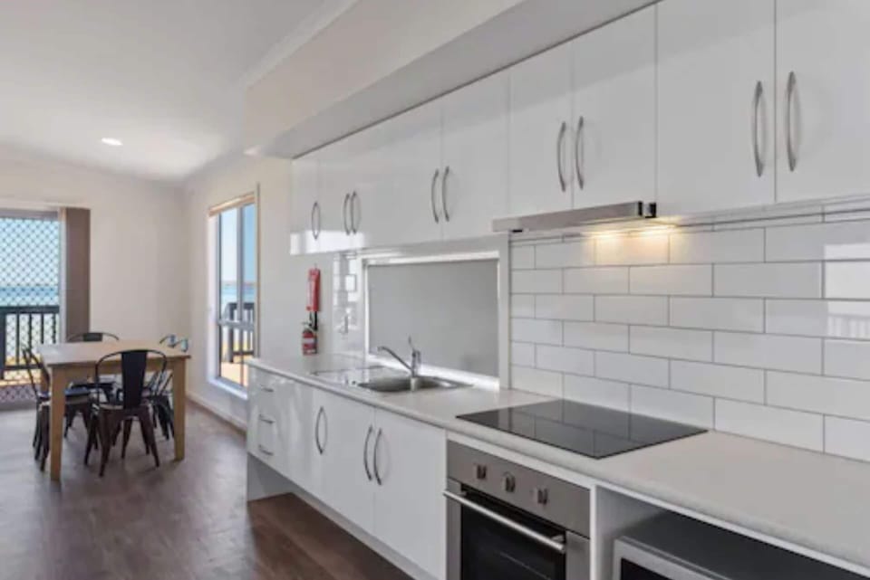 Deluxe 2 Bedroom Beachfront Access Cabin | Private kitchen | Fridge, microwave, stovetop, electric kettle