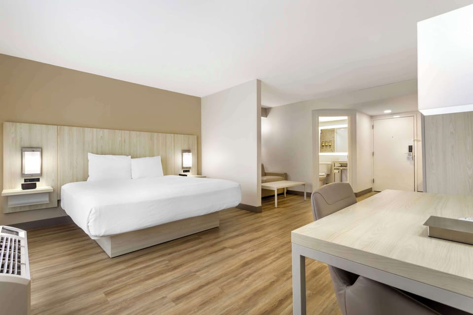 Suite, 1 King Bed, Non Smoking, Refrigerator & Microwave (Larger Room;with Sofabed) | Premium bedding, desk, laptop workspace, blackout drapes