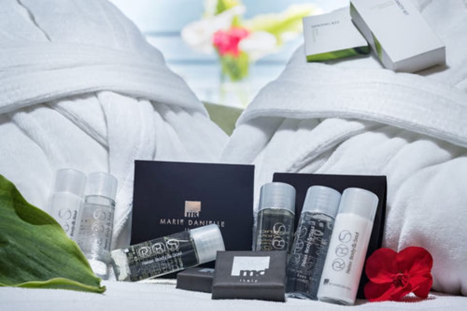 Premium bedding, down comforters, memory foam beds, in-room safe