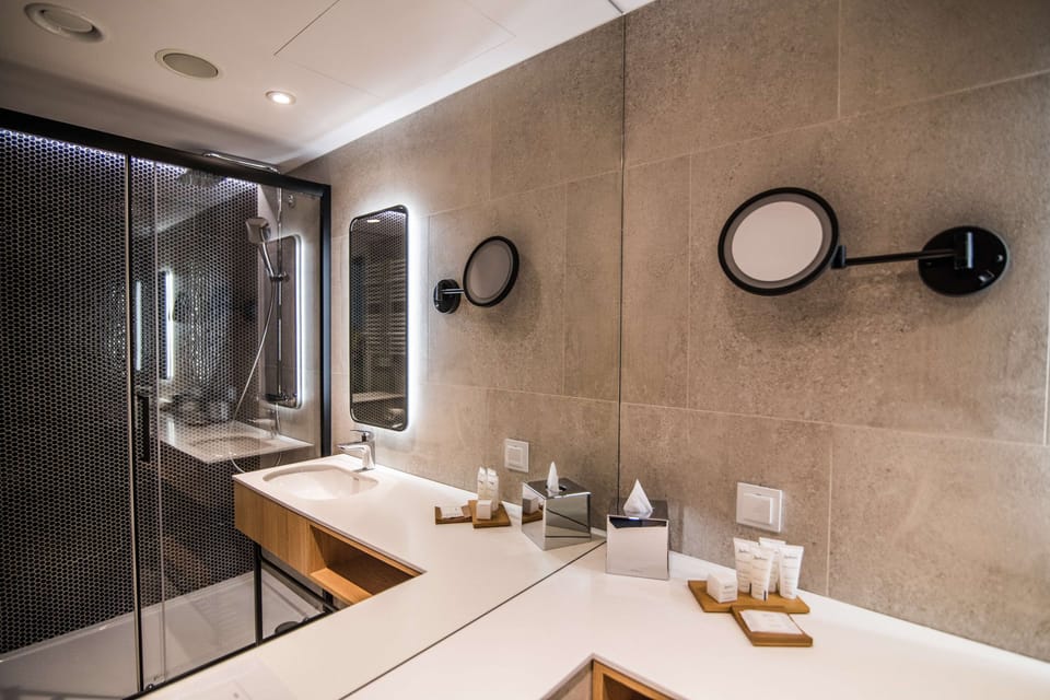 Shower, rainfall showerhead, eco-friendly toiletries, hair dryer