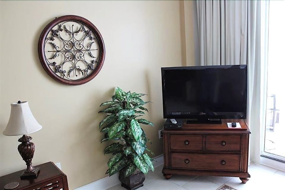 Condo, 2 Bedrooms, Balcony, Beachfront | Living area | Flat-screen TV, DVD player