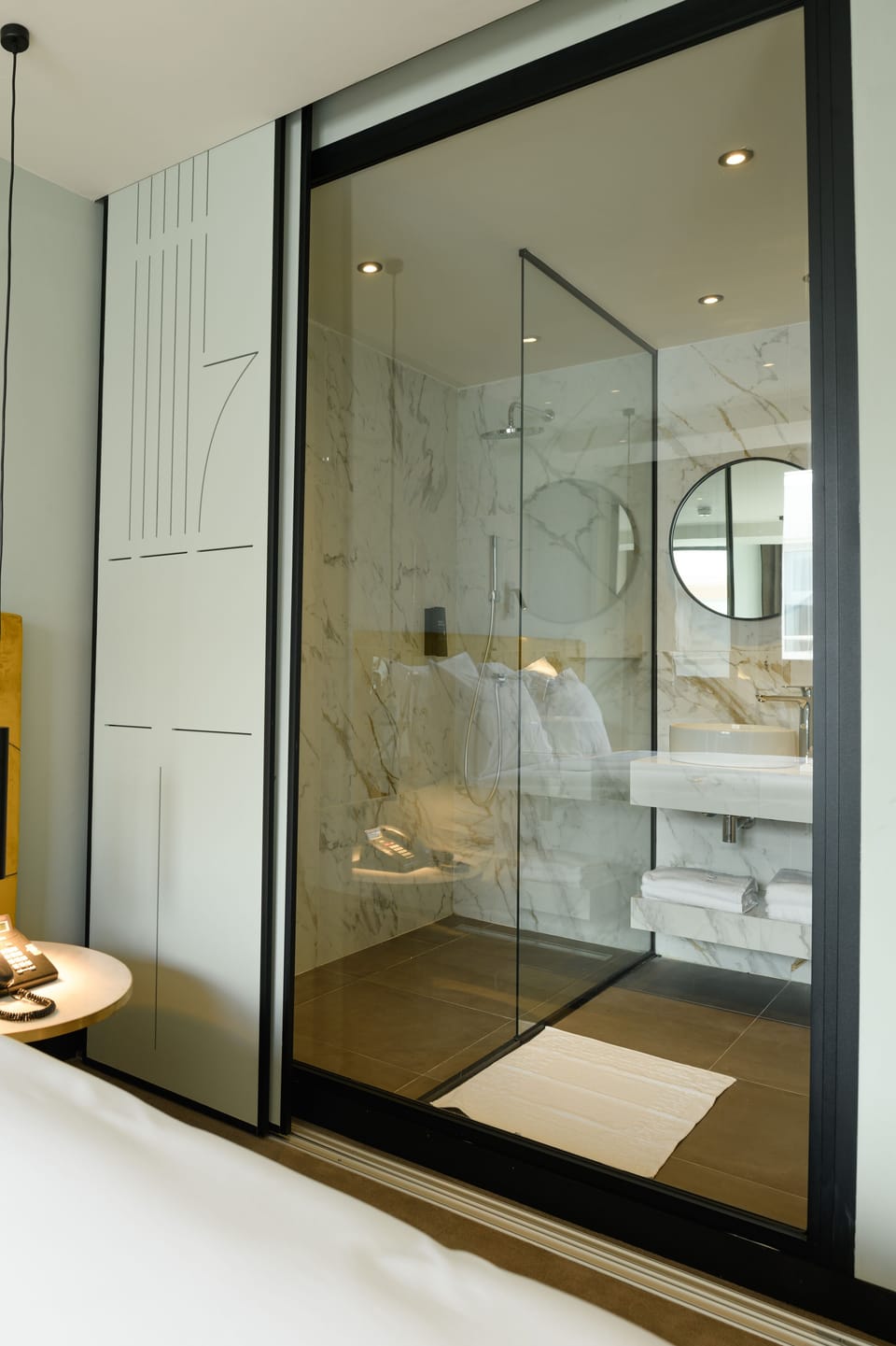 Shower, rainfall showerhead, designer toiletries, hair dryer