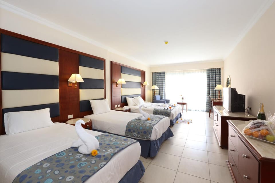 Family Room, 2 Bedrooms | Minibar, in-room safe, blackout drapes, soundproofing