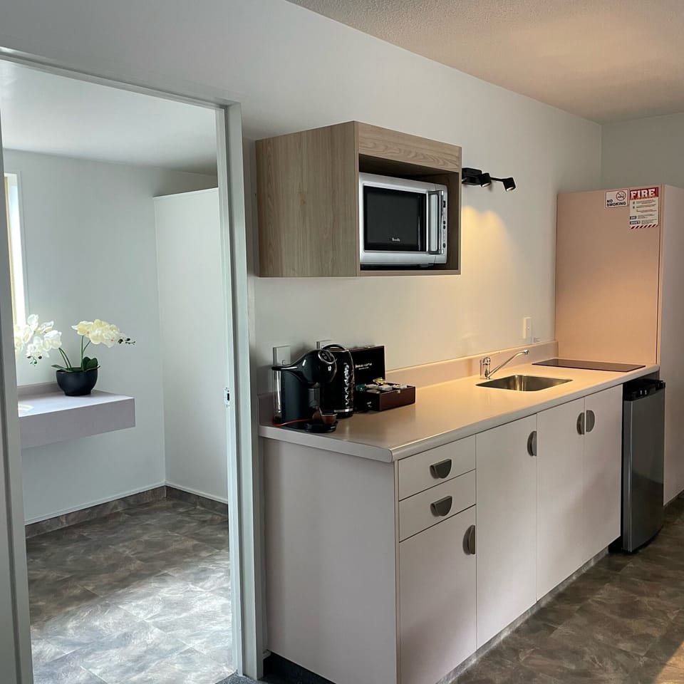 Two Bedroom Apartment | Private kitchen | Coffee/tea maker, fridge, microwave, electric kettle