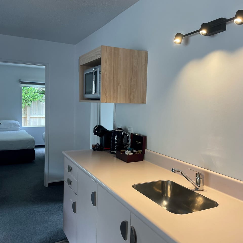 Two Bedroom Apartment | Private kitchen | Coffee/tea maker, fridge, microwave, electric kettle