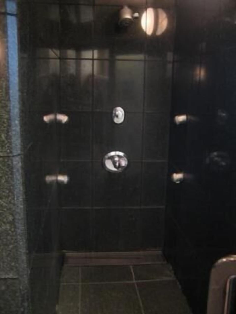 Combined shower/tub, free toiletries, hair dryer, slippers