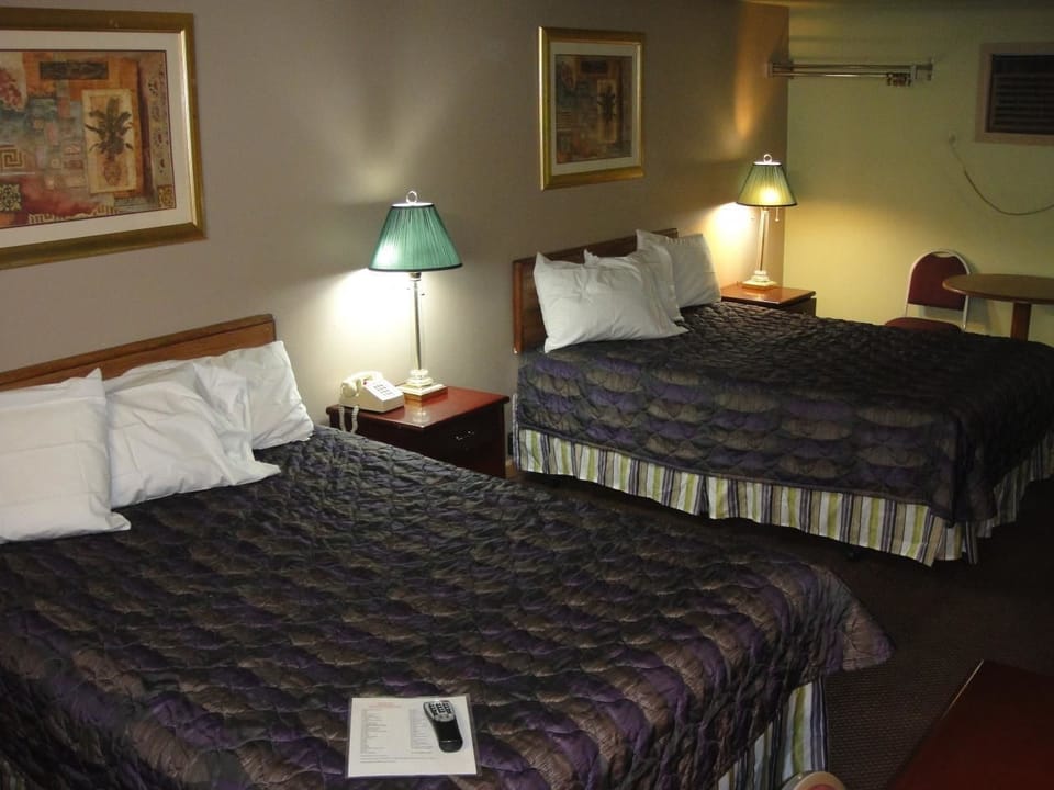 Standard Room, 2 Queen Beds | Desk, iron/ironing board (on request), WiFi (free), bed sheets