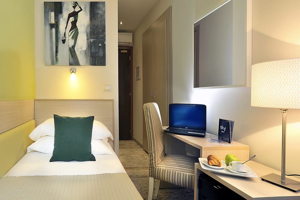 Select Comfort beds, minibar, in-room safe, desk