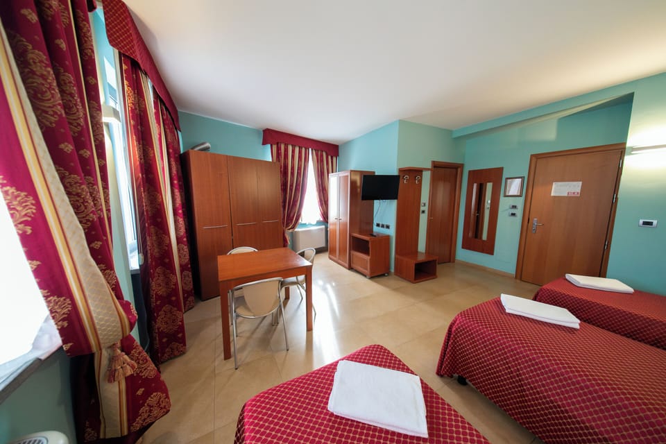 Triple Room | Minibar, in-room safe, desk, soundproofing