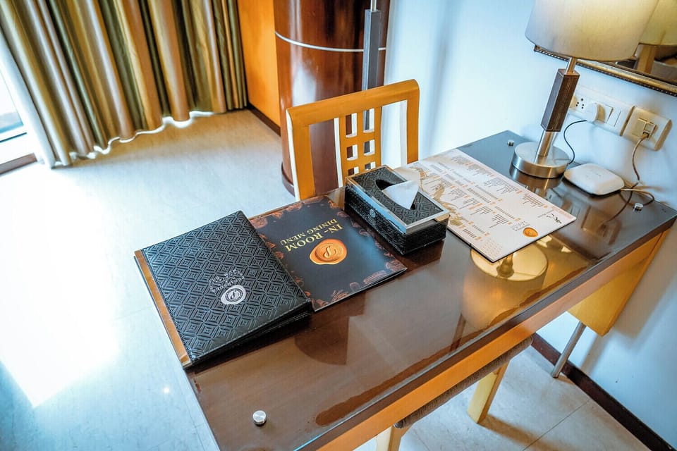 Executive Room | Premium bedding, minibar, in-room safe, desk