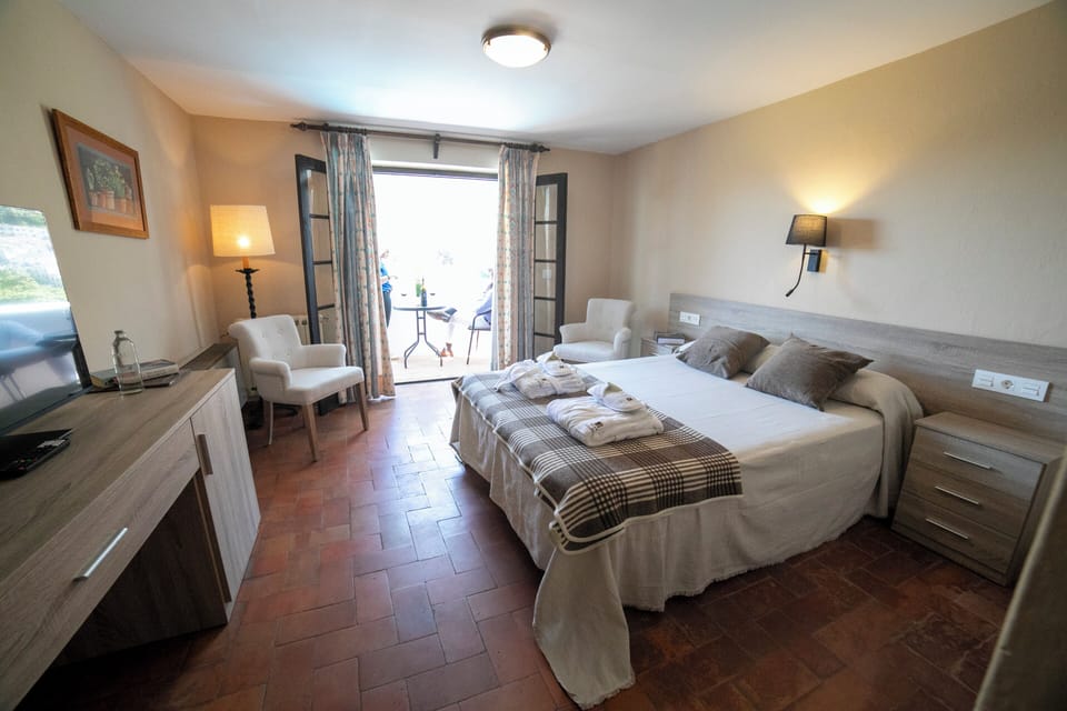 Double Room with Balcony and View | Desk, blackout drapes, free WiFi, bed sheets