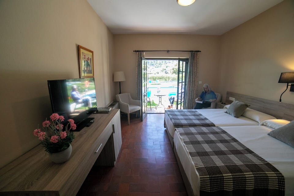 Desk, blackout drapes, free WiFi, bed sheets
