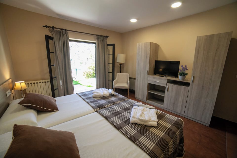 Double Room with Balcony and View | Desk, blackout drapes, free WiFi, bed sheets