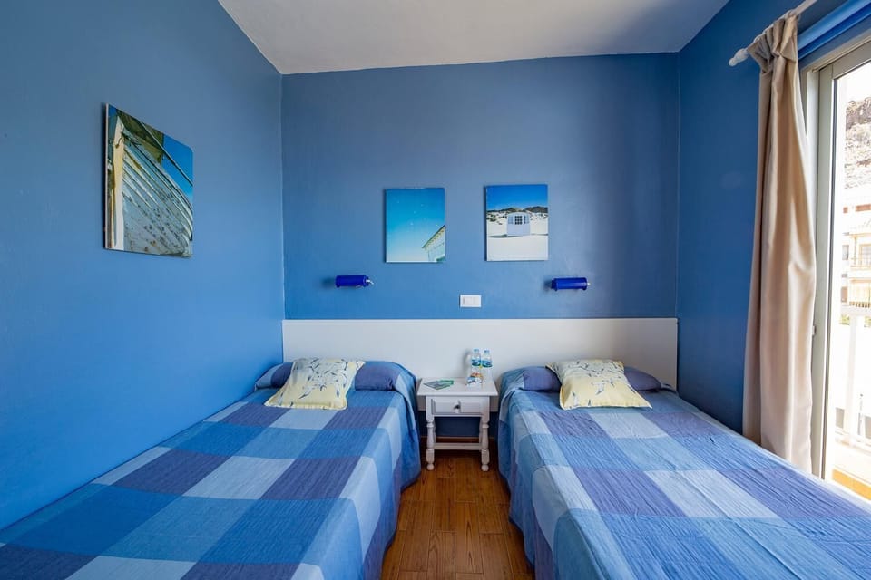 Desk, blackout drapes, free WiFi, bed sheets