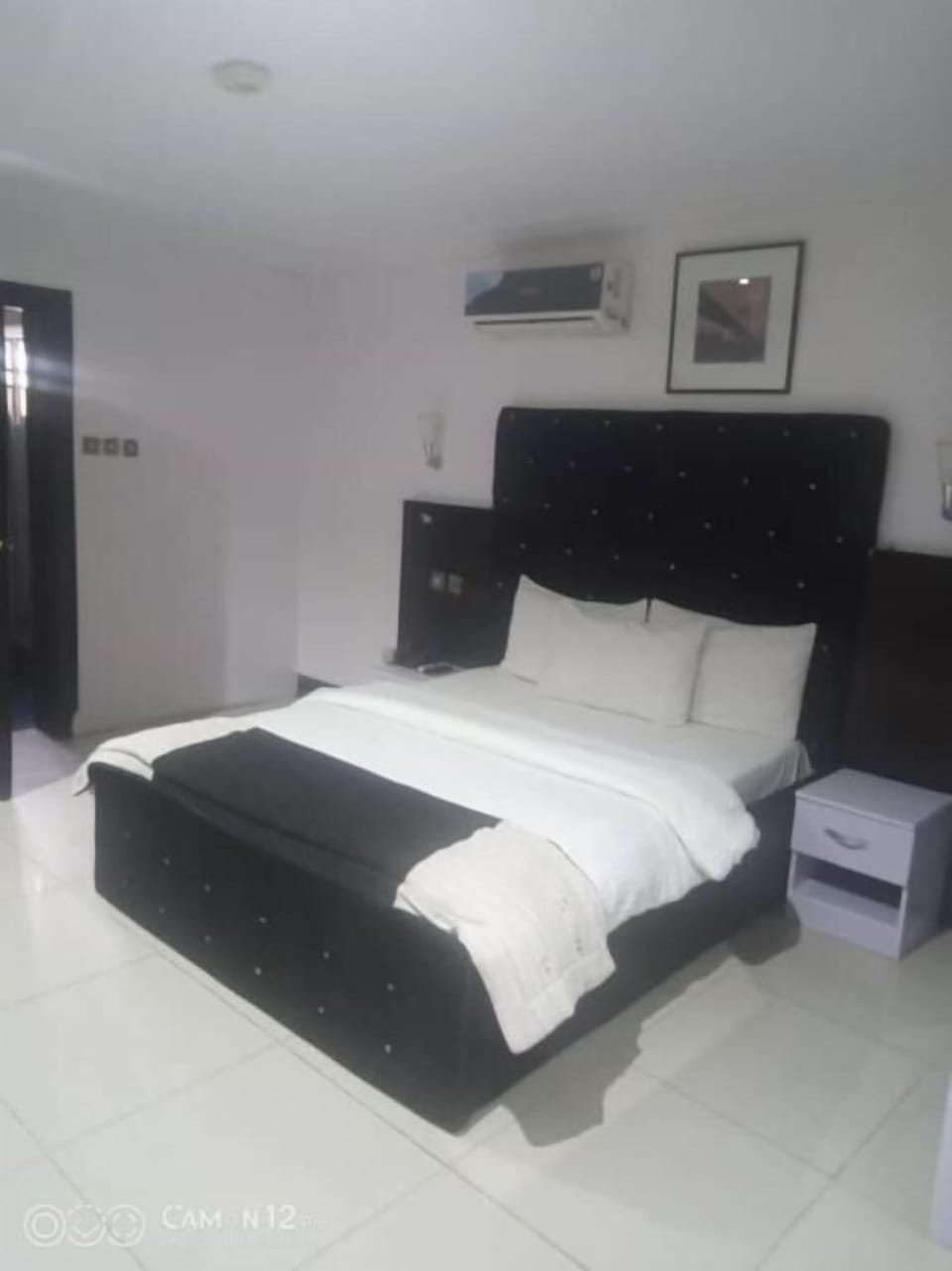Desk, laptop workspace, bed sheets