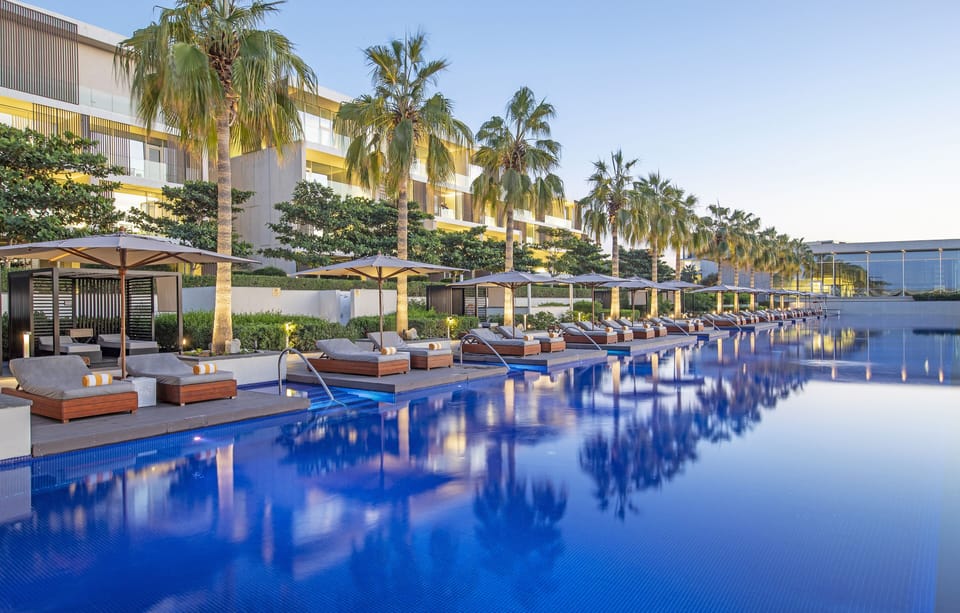 Outdoor pool, open 7:00 AM to 6:00 PM, pool umbrellas, sun loungers
