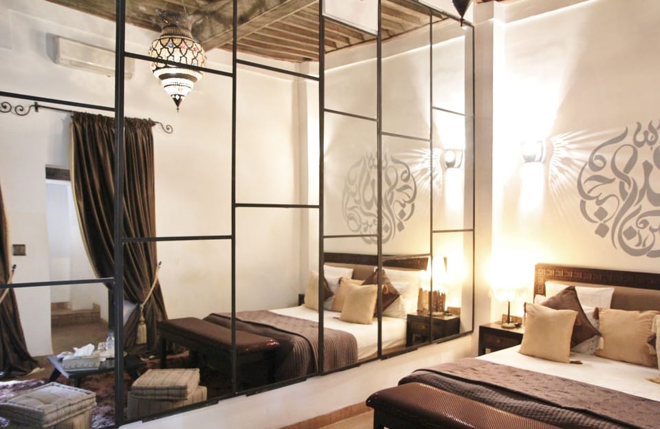 Comfort Suite, 1 Bedroom | In-room safe, individually decorated, blackout drapes, soundproofing