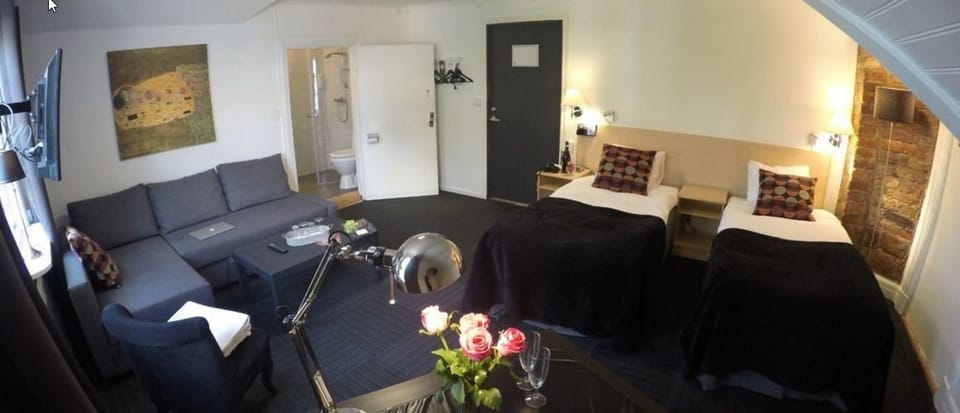 Double Room | Desk, blackout drapes, iron/ironing board (on request)