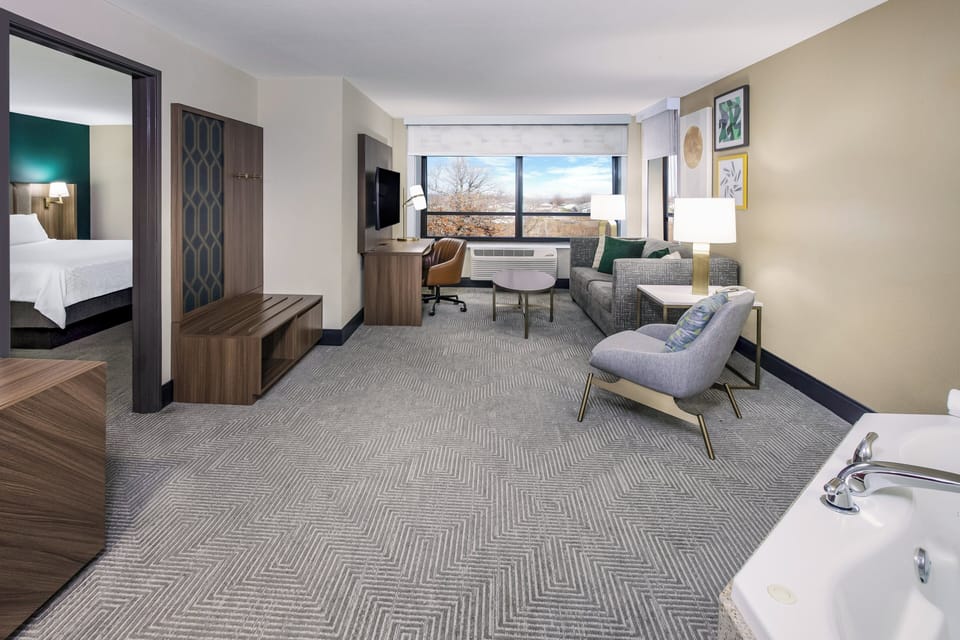 Suite, 1 King Bed with Sofa bed, Jetted Tub | Premium bedding, pillowtop beds, in-room safe, desk