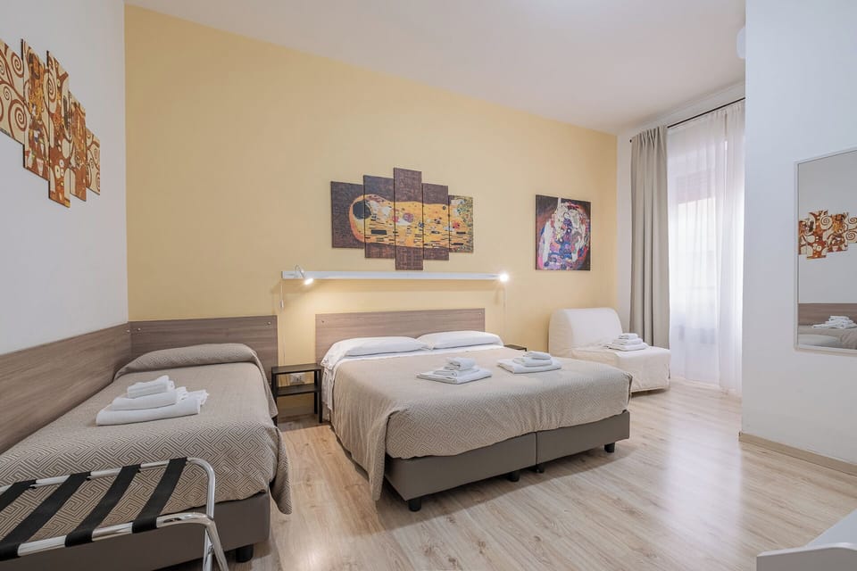 Quadruple Room | Premium bedding, free minibar, in-room safe, desk