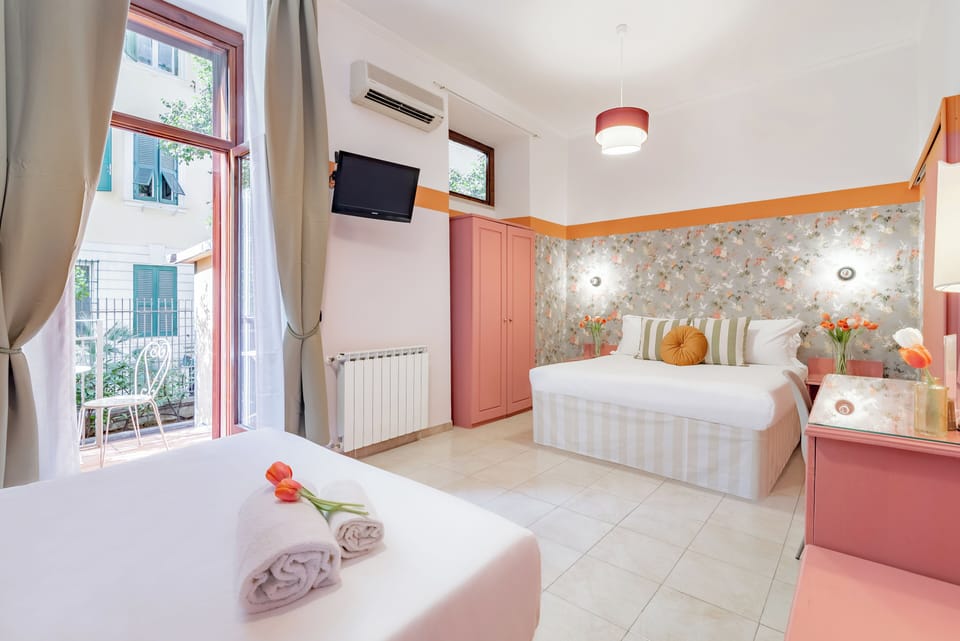 Deluxe Quadruple Room with Garden | Minibar, in-room safe, desk, free WiFi