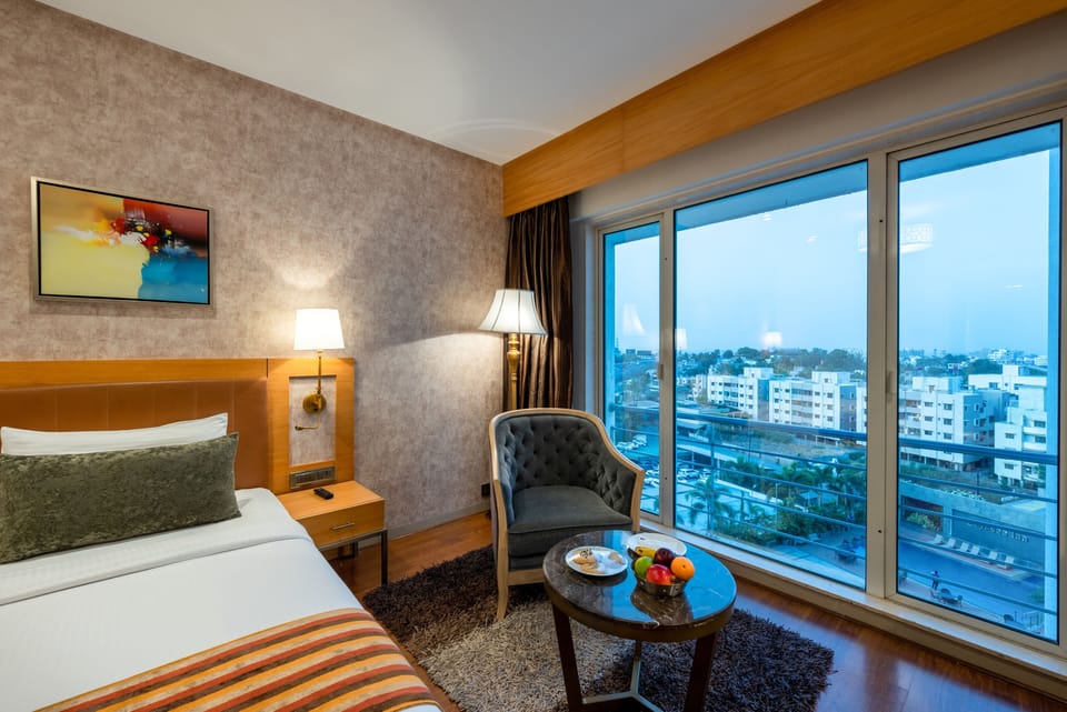 Deluxe Room (Delicate Soft and Light Décor) | Egyptian cotton sheets, premium bedding, down comforters